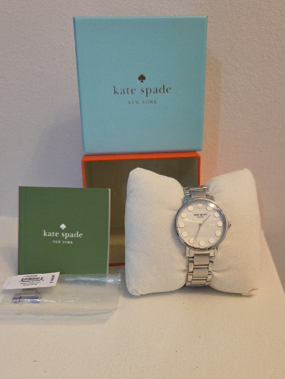 kate spade silver-tone mother-of-pearl dot dial watch